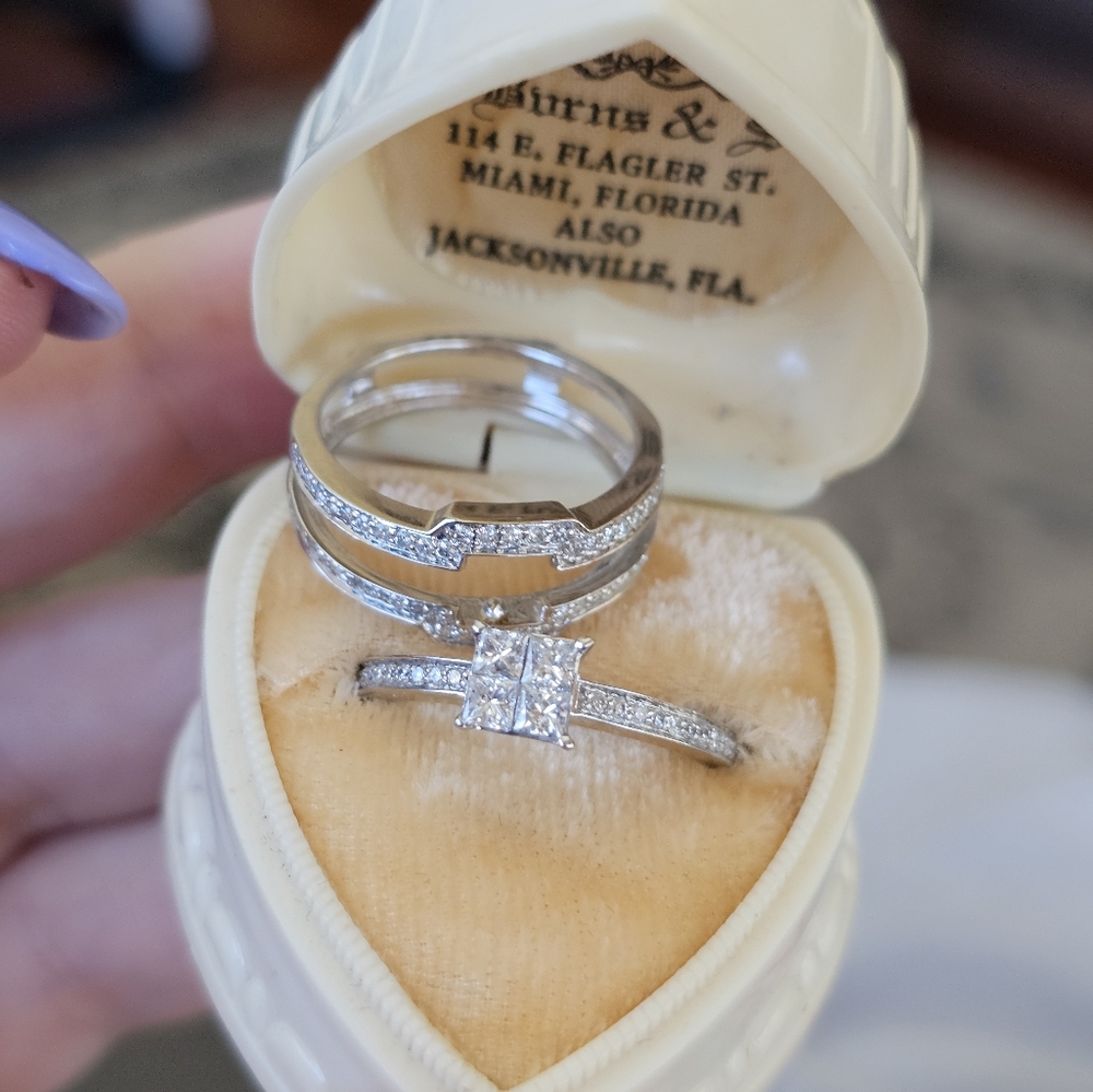 New. 14k white gold wedding set includes engagement ring and enhancer ring. Stam